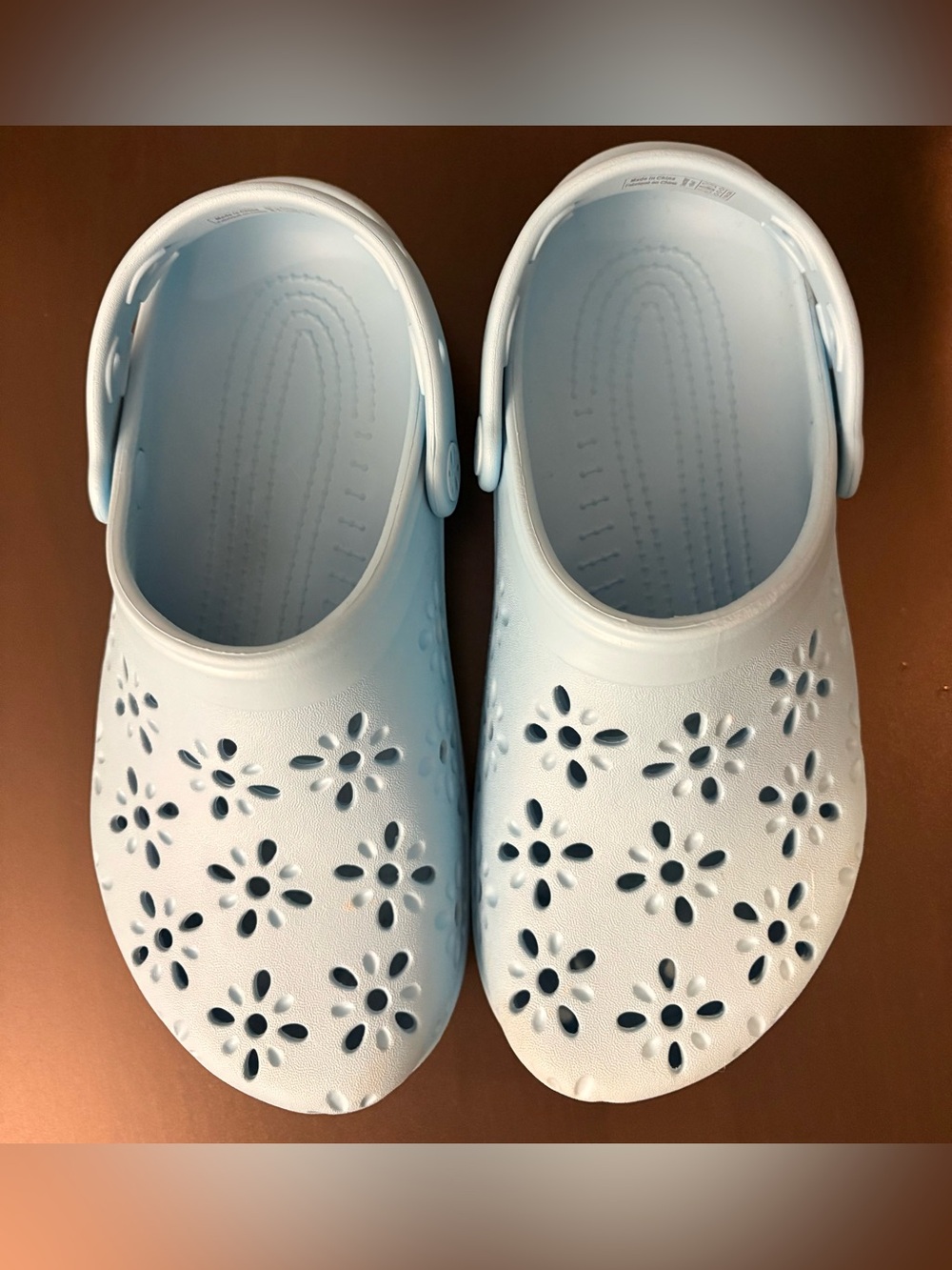 Light blue crocs 7 W